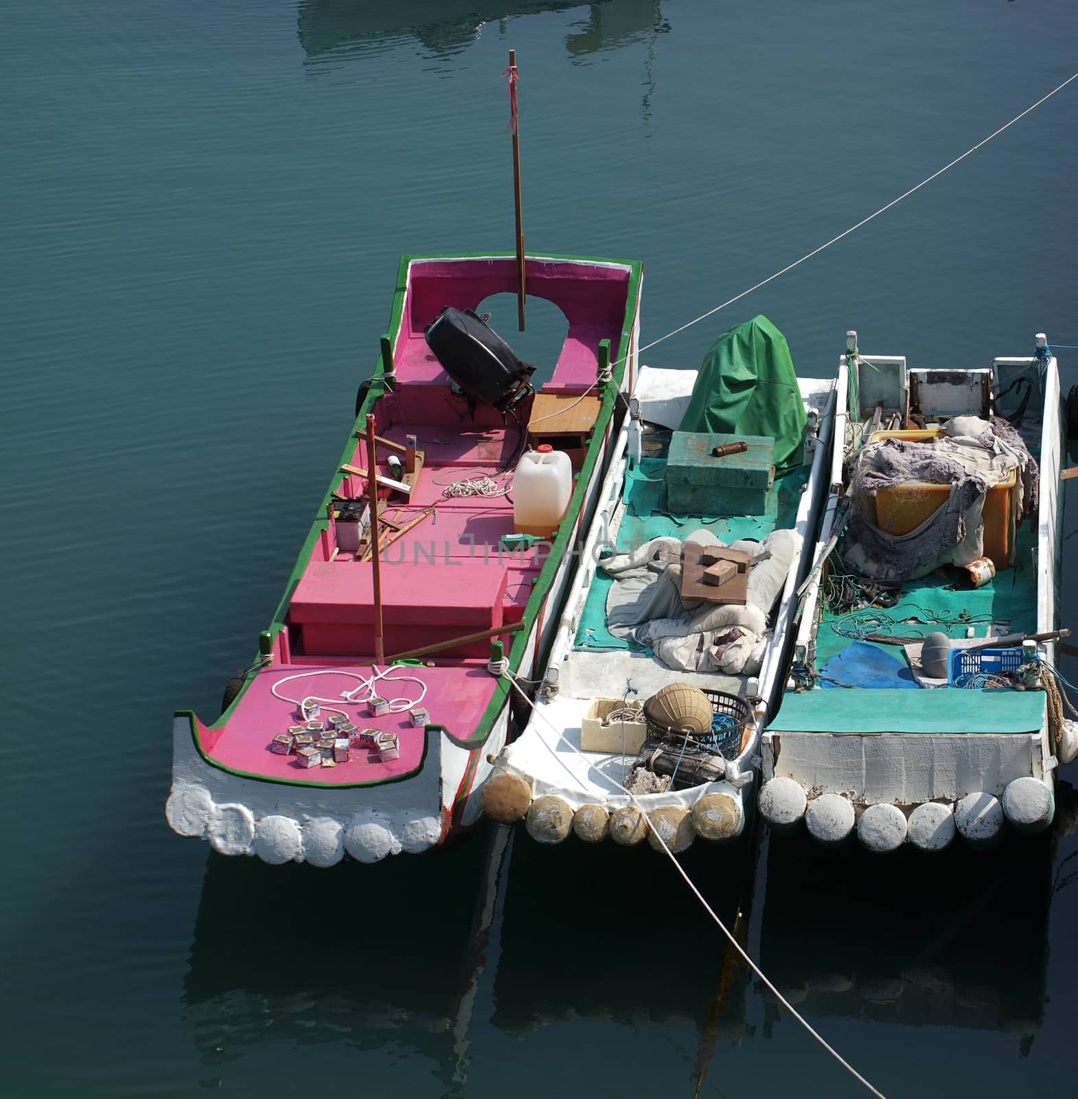 Small Fishing Boats Tied Up In Port by shiyali