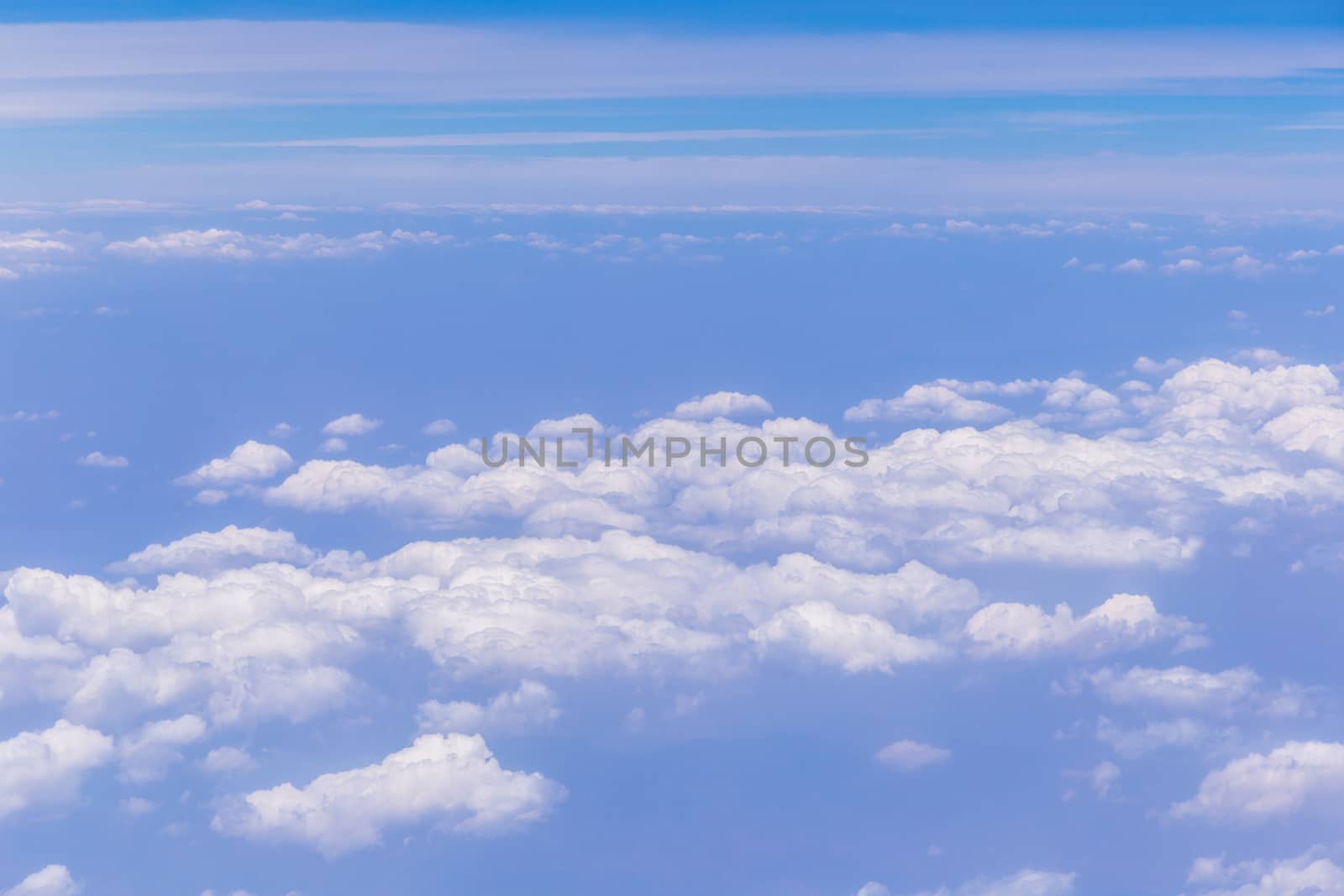 Blue sky background with white clouds on sunny day by phanthit