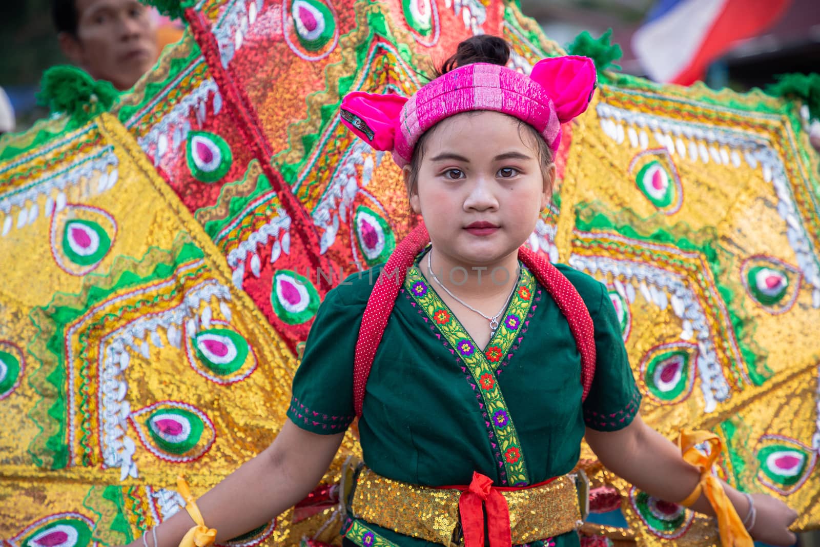 Thoet Thai, Chiang Rai - THAILAND, November 27, 2019 : Cute girl of Shan or Tai Yai (ethnic group living in parts of Myanmar and Thailand) in tribal dress on Shan New Year celebrations.