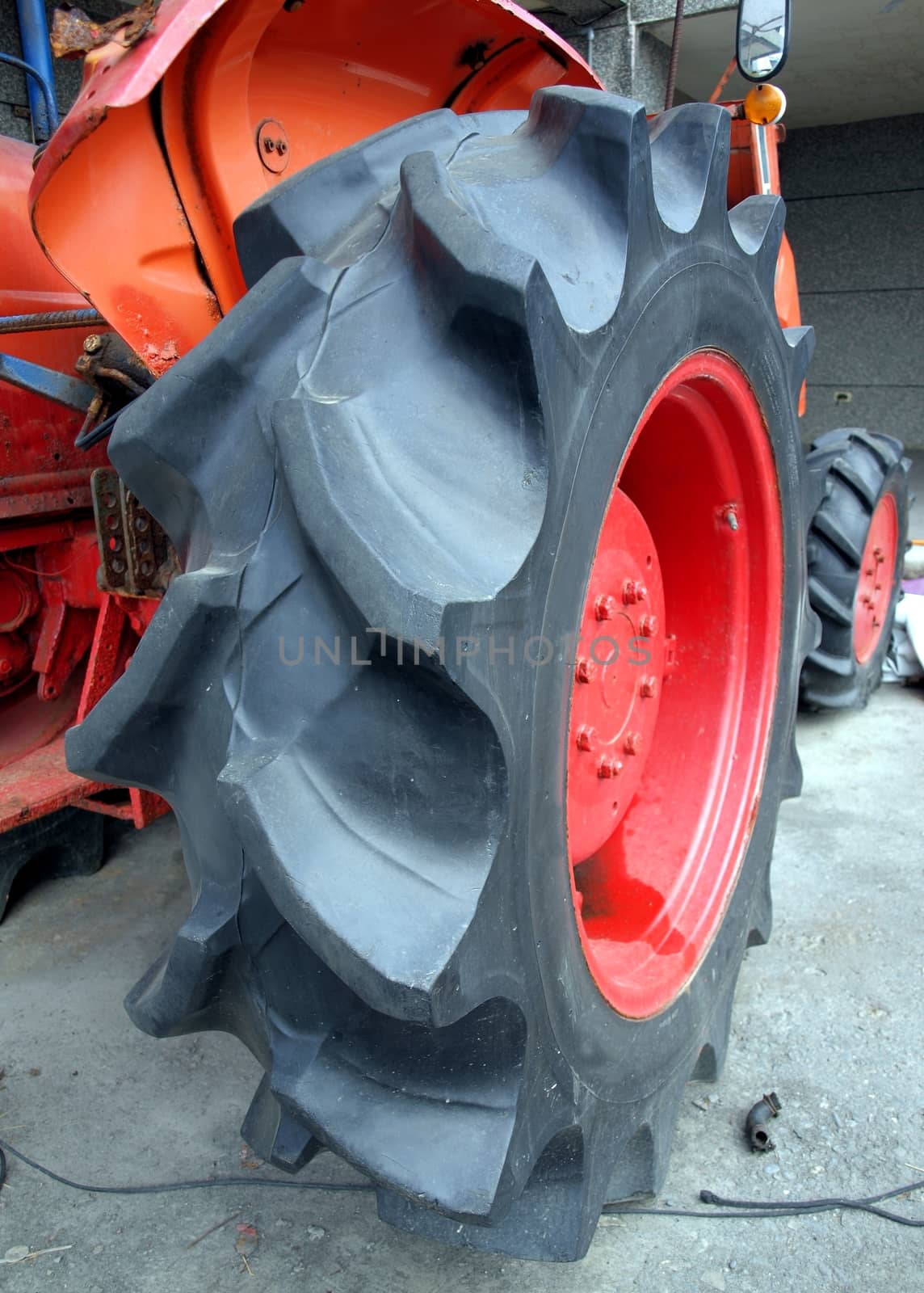 The massive tire of an agricultural machine