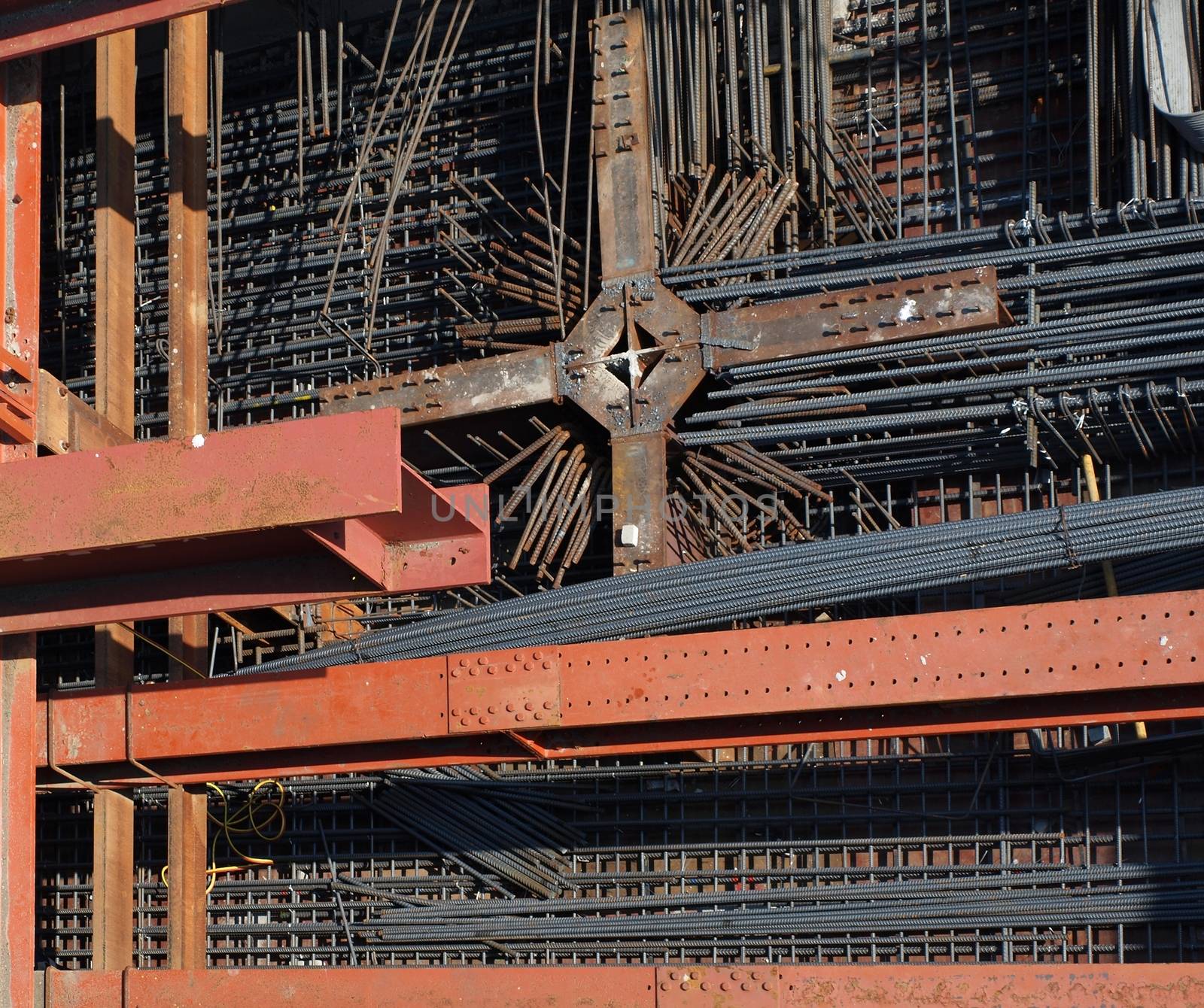 A large underground construction site with strong steel girders