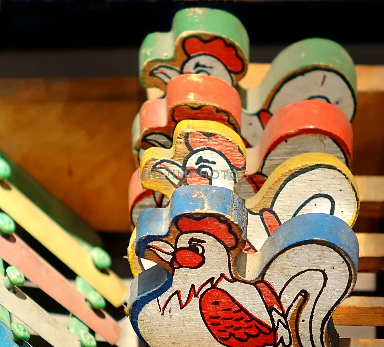 A retro era toy for young children with four wooden hens