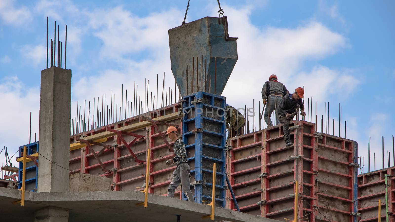 Moscow, Russia-15.05.2020:Construction of a multi-storey residential building. Pre-fabricated structures and products. The construction of a new building or skyscraper.