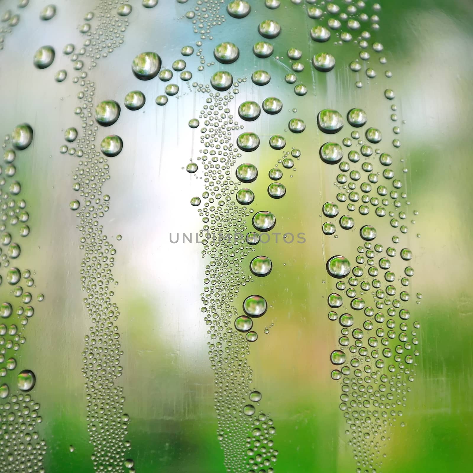 Drops of water on the crooked glass, shallow dof