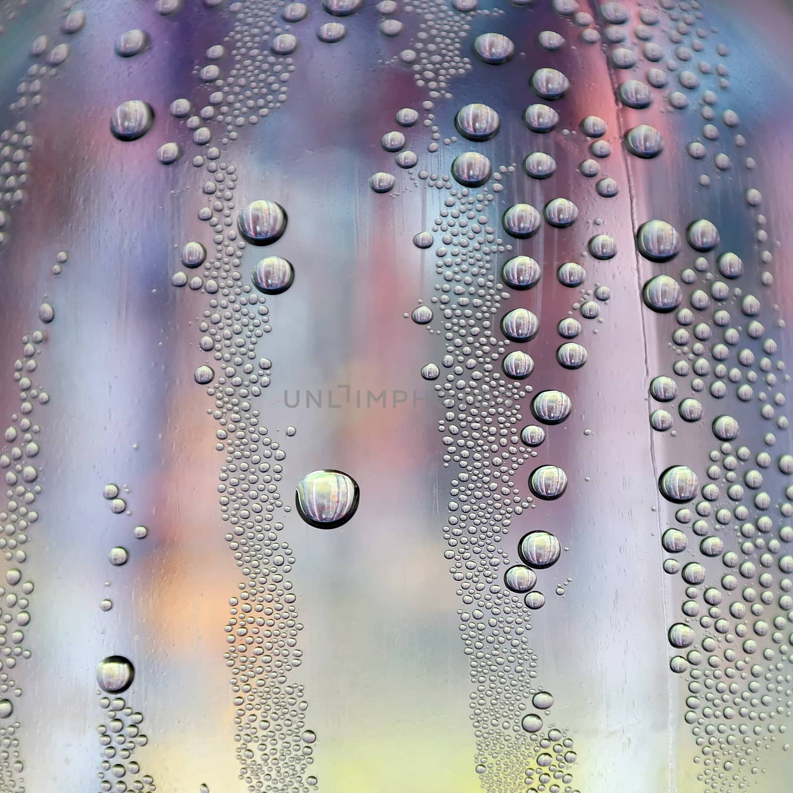 Drops of water on the crooked glass, shallow dof