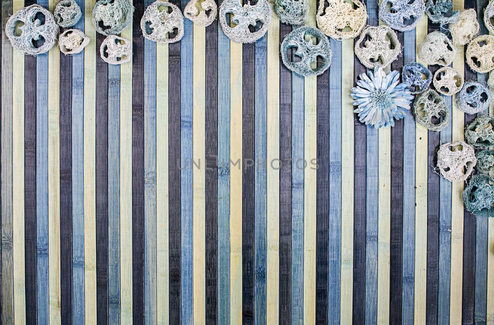 Background composition on wood in shades of light blue and blue with a matching potpourri contour