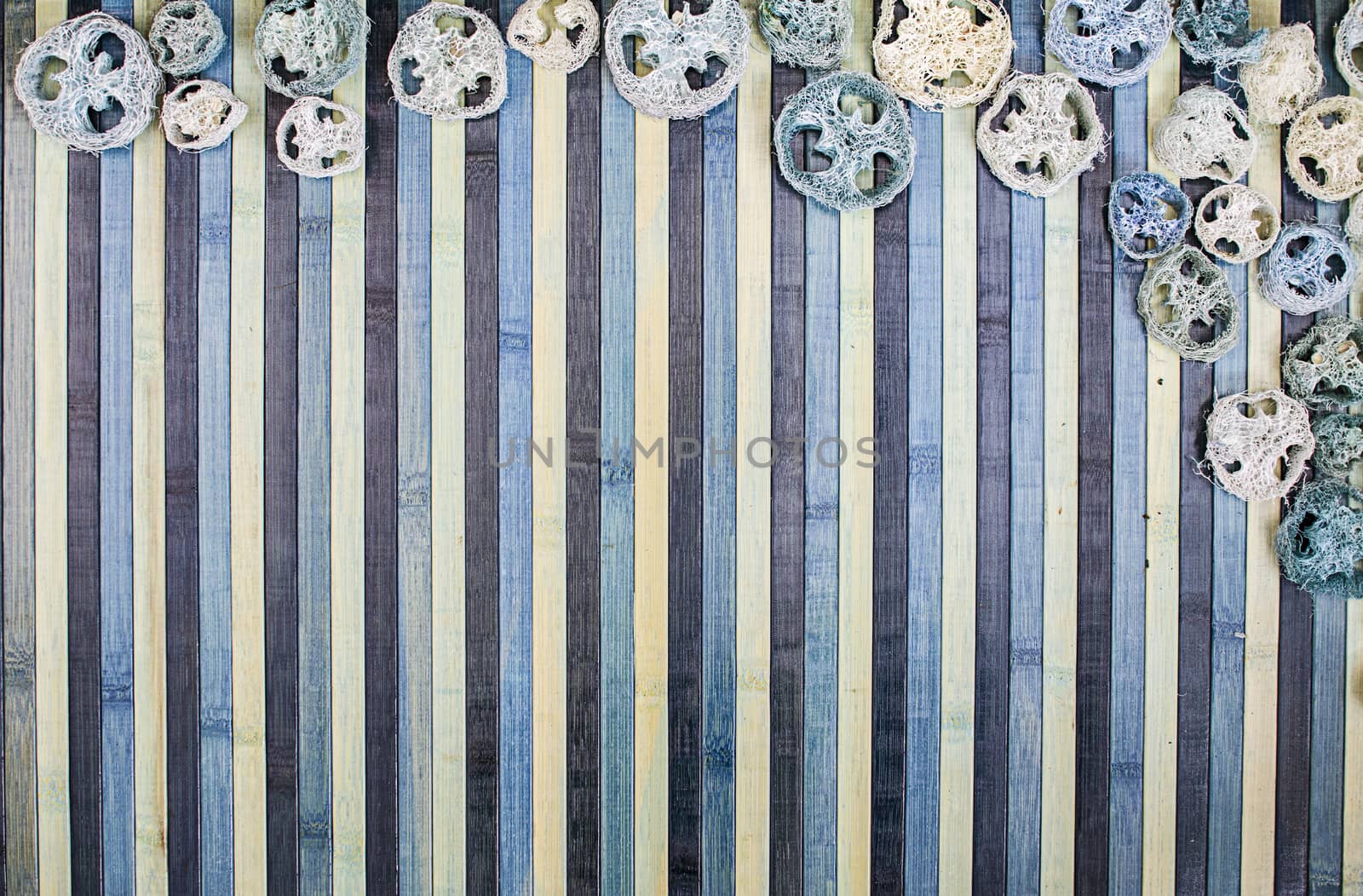 Background composition on wood in shades of light blue and blue with a matching potpourri contour