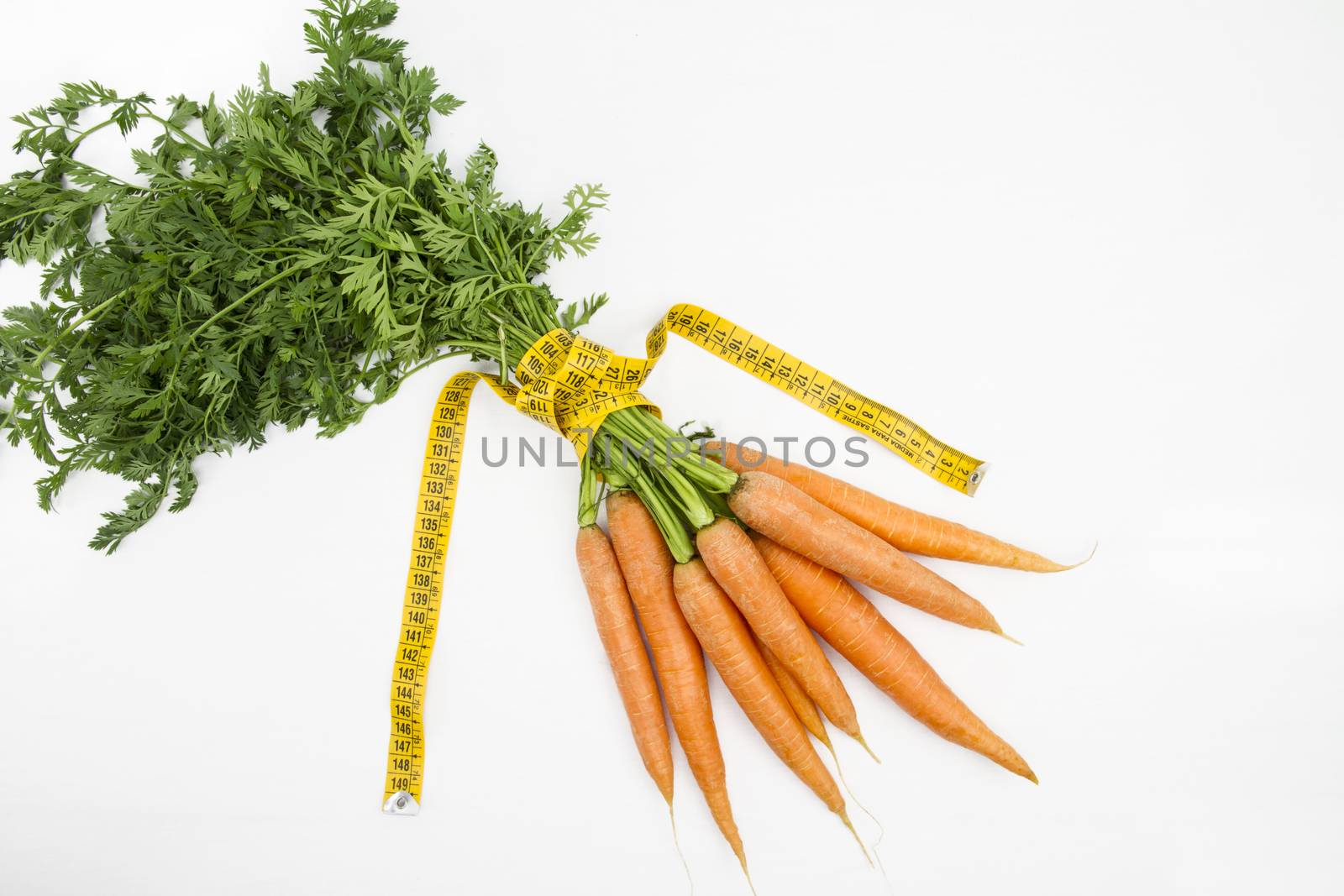 Vegetarian diet to reduce weight. A bunch of freshly picked carr by robbyfontanesi