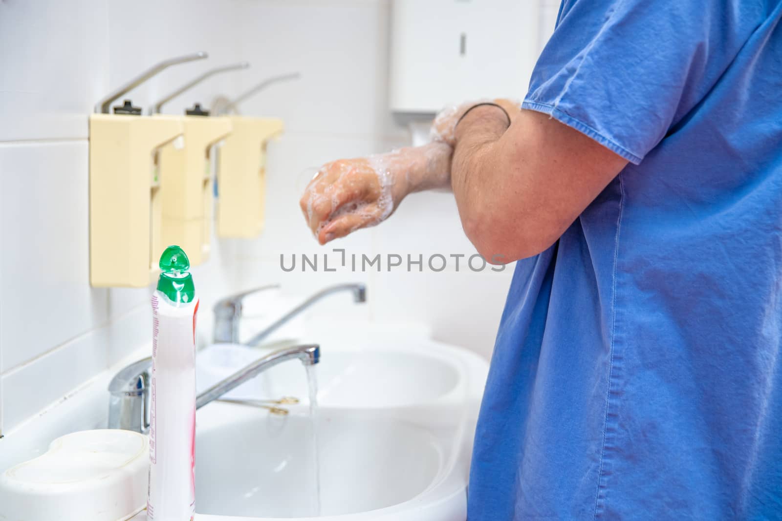 Washing hands with disinfectant soap as a precaution against disease and infection. The basic daily hygiene.