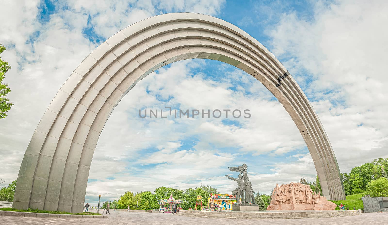 Peoples Friendship Arch with sculptural elements and statues is a monument in Kiev, Ukraine by chernobrovin