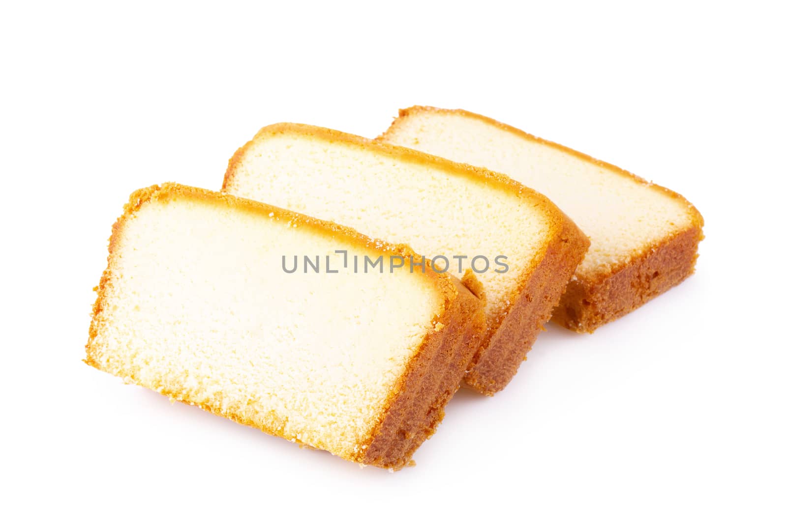 Sliced moist butter cake isolated over the white background.