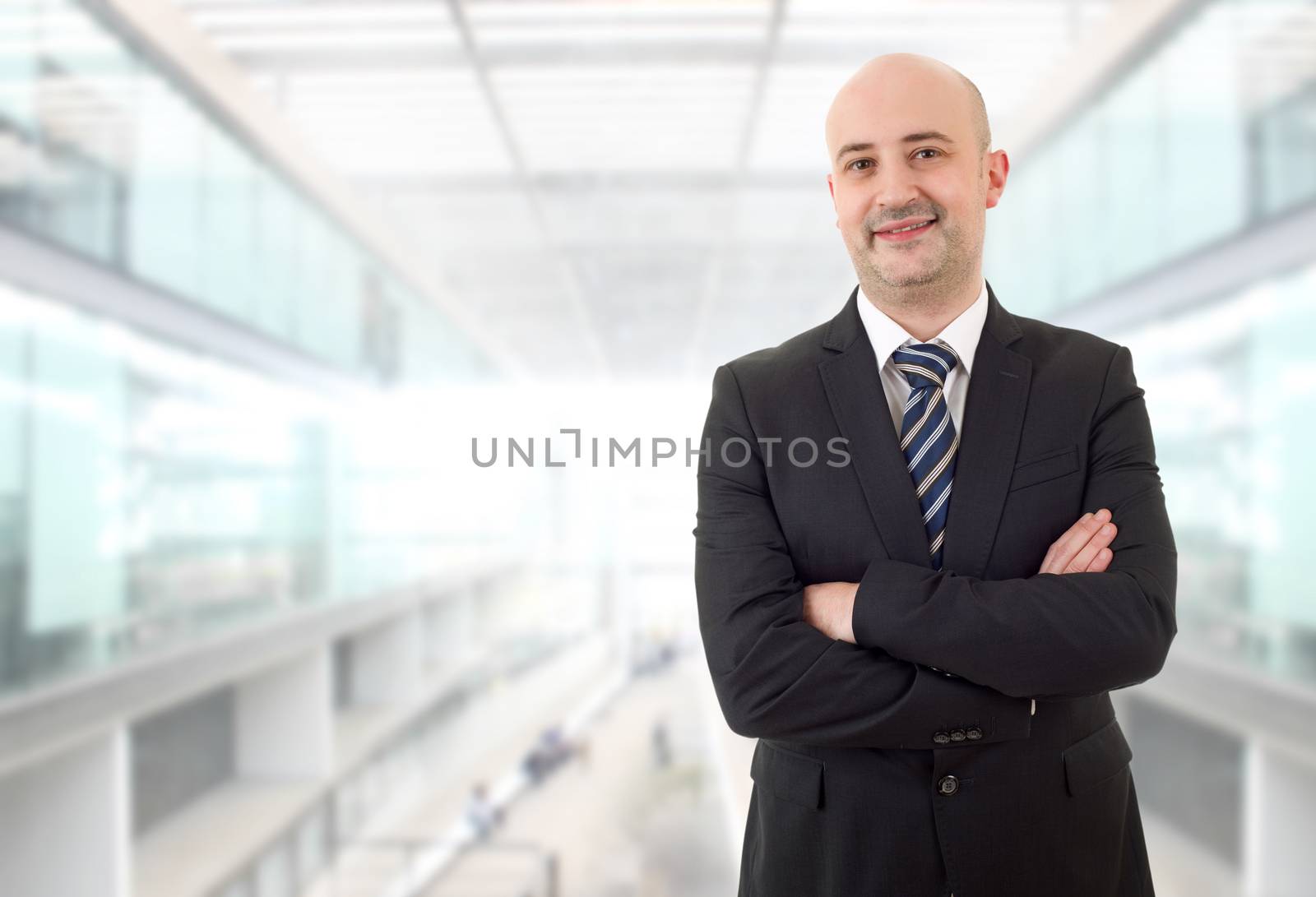 happy business man portrait at the office