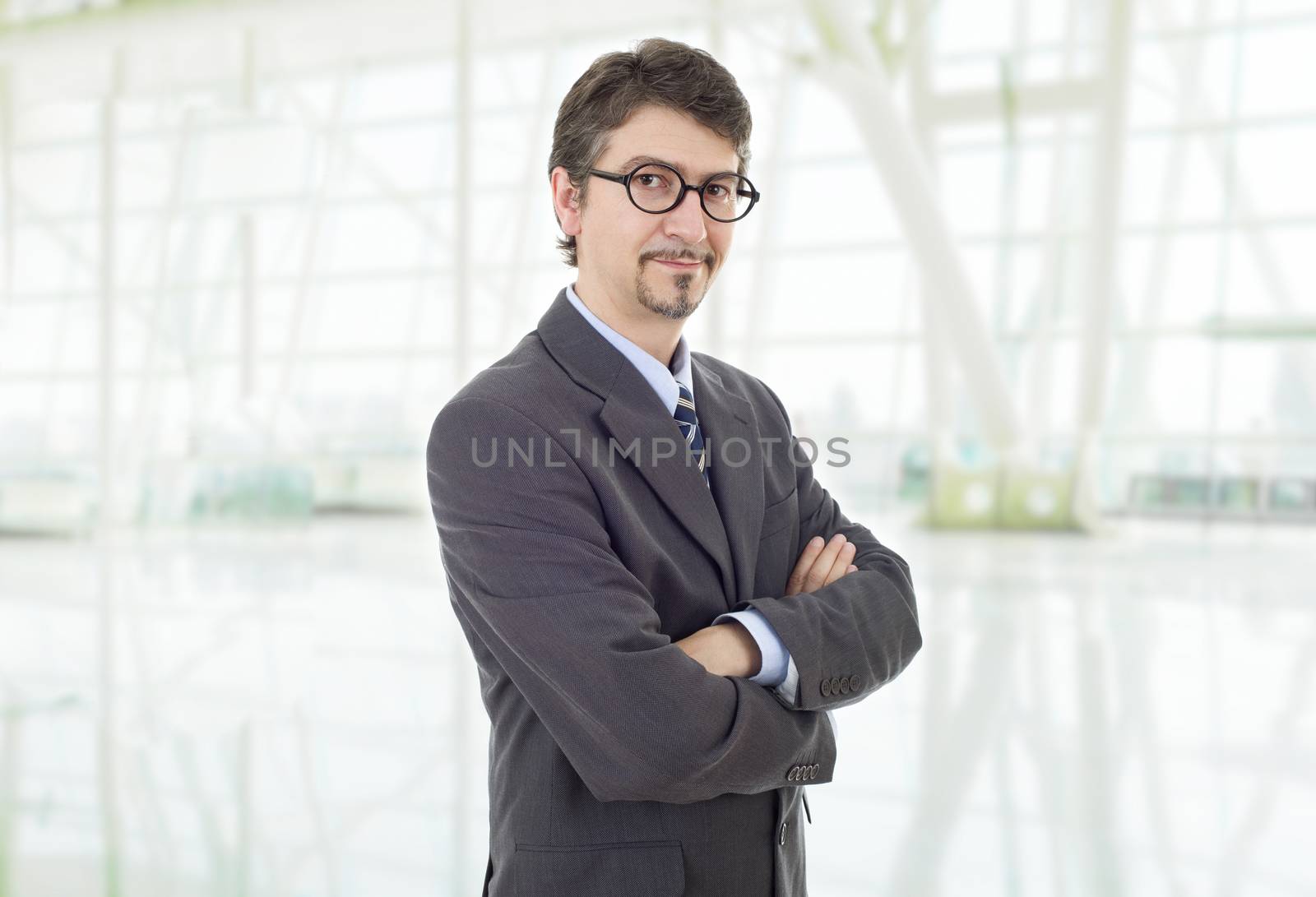 young business man portrait at the office