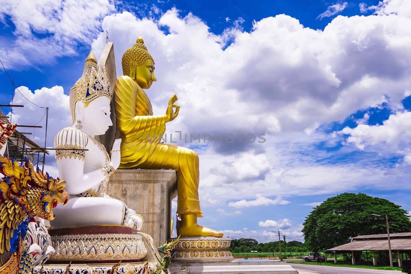 Nakhon Pathom, Thailand - June, 09, 2020 : Big Buddha statue of Chareon Rat Bamrung Temple (Nong Phong Nok Temple) the place of faith in Nakhon Pathom,Thailand