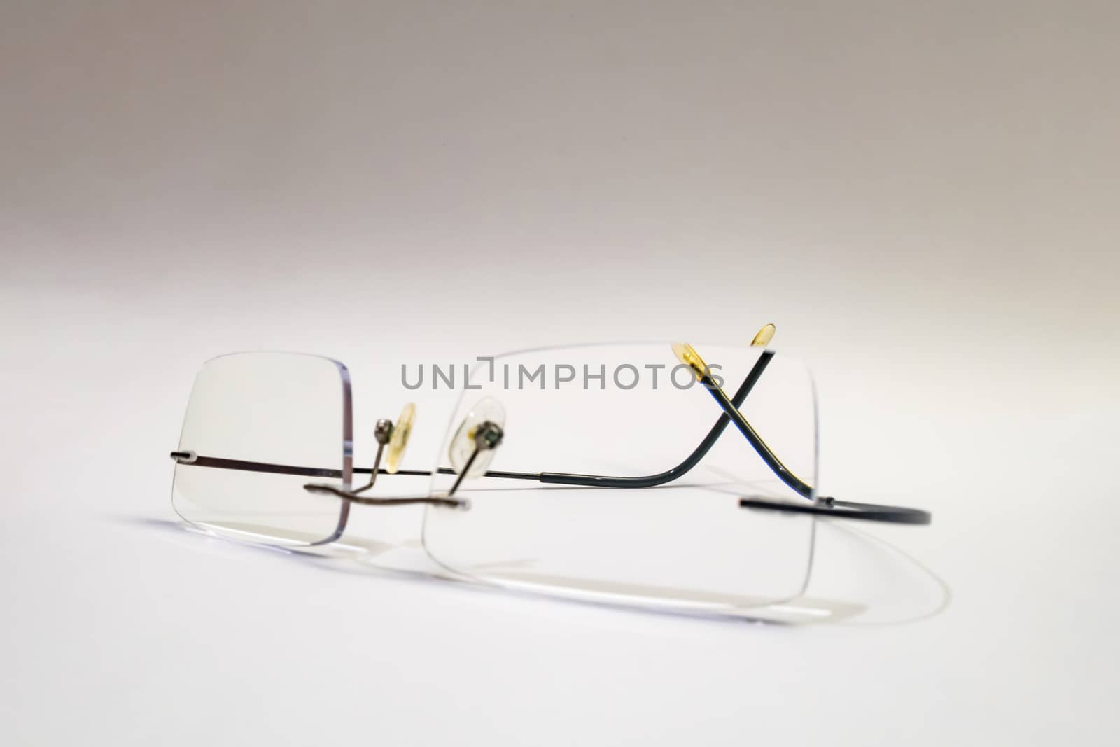 close up eyeglasses on white background