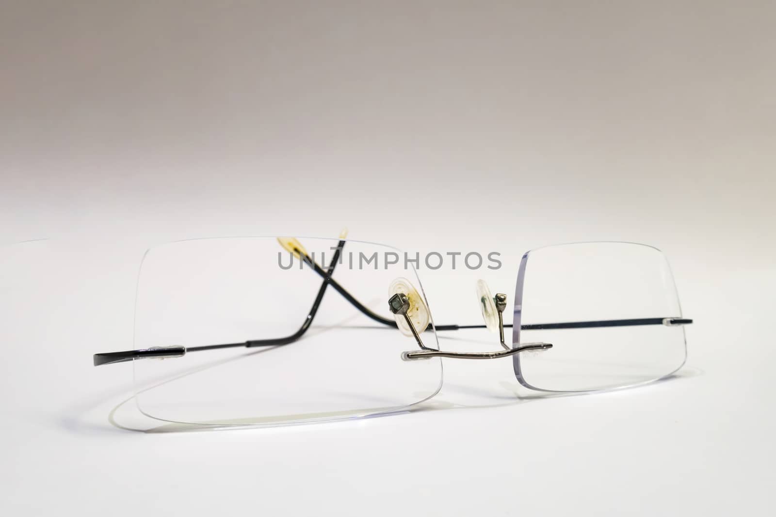 close up eyeglasses on white background