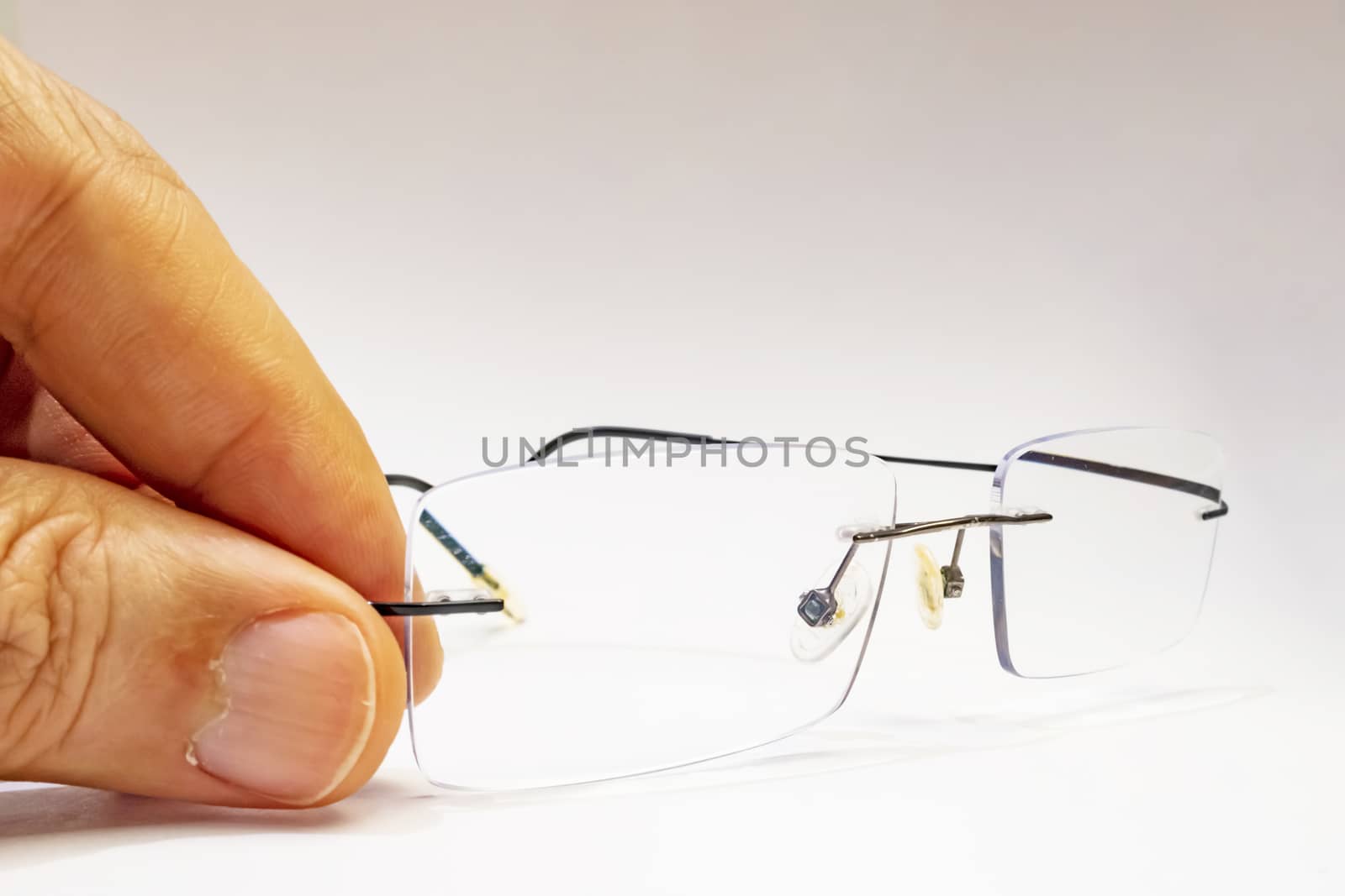 close up eyeglasses on white background