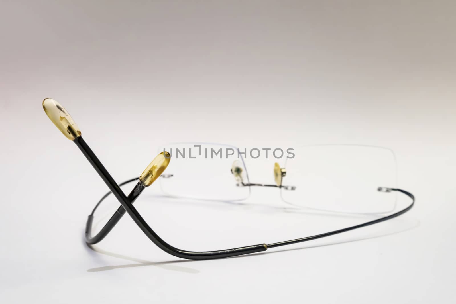 close up eyeglasses on white background