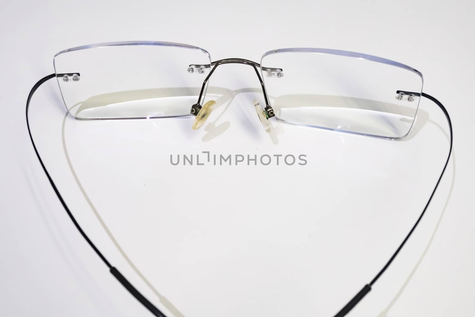 close up eyeglasses on white background