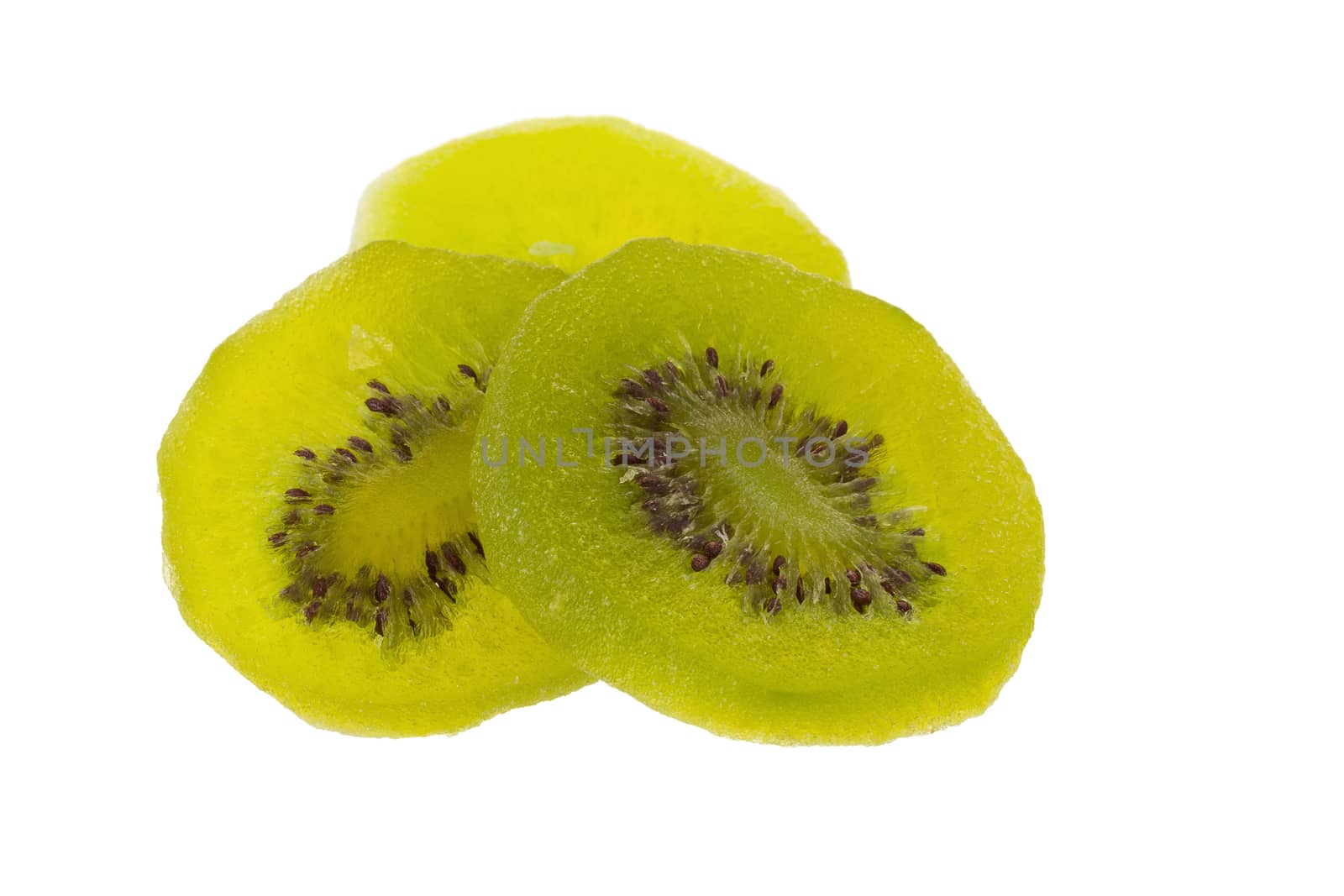 Dried kiwi fruit, dried preserved candied kiwifruit slices sugary sweet snack isolated on white background.