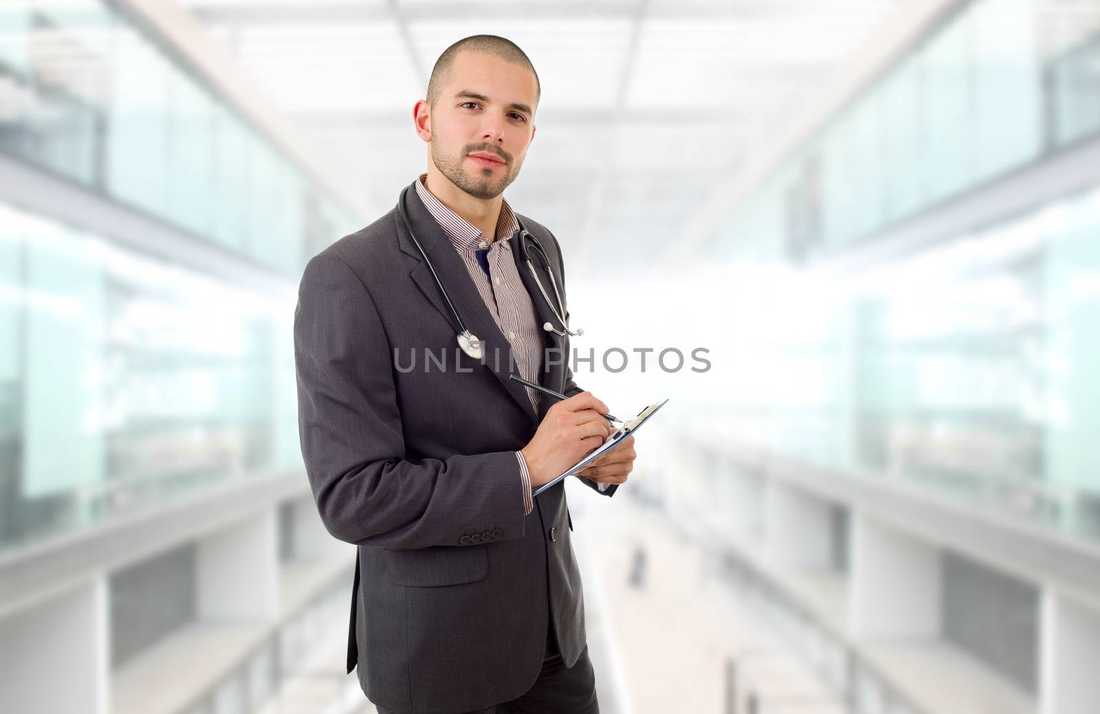 happy male doctor, at the hospital