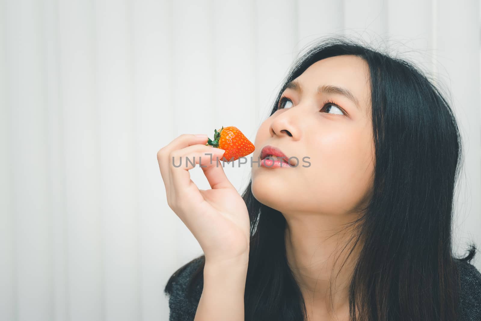 Woman eat strawberry red berry fruit sweet juicy by PongMoji