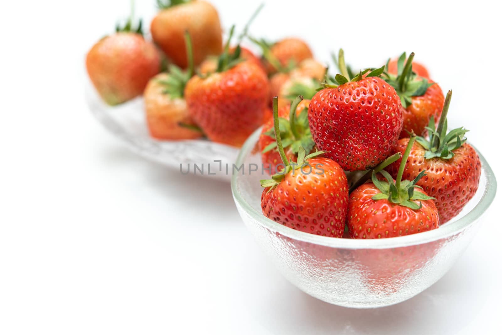 Strawberry is red fresh berry fruit color and sweet juicy for sale at Thai street food and fruit market in concept food and fruit, healthy eating in life