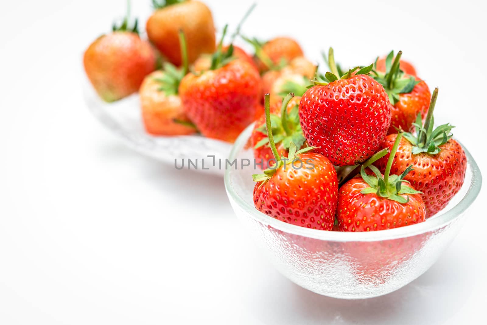 Strawberry is red fresh berry fruit color and sweet juicy for sale at Thai street food and fruit market in concept food and fruit, healthy eating in life