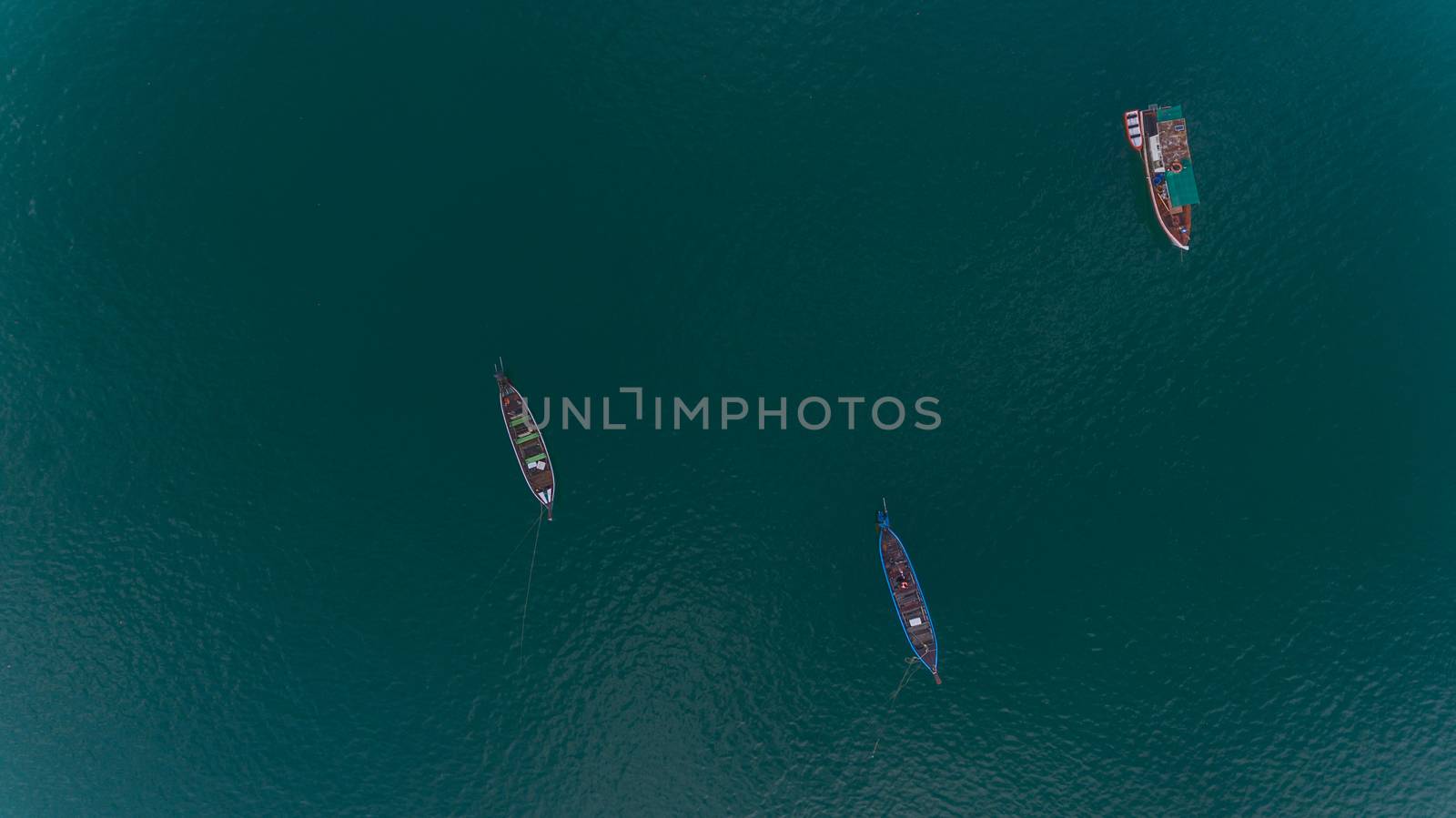 Aerial view of Local fisherman boat in blue sea Soth of Thailand by wyoosumran