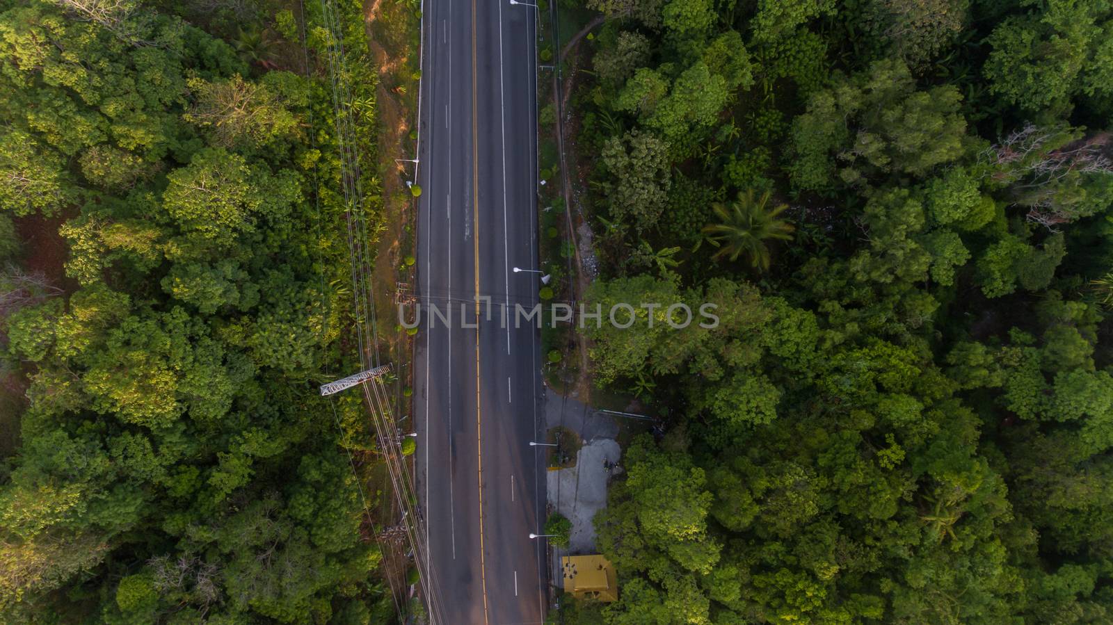 Aerial local road in Soth of Thailand by wyoosumran