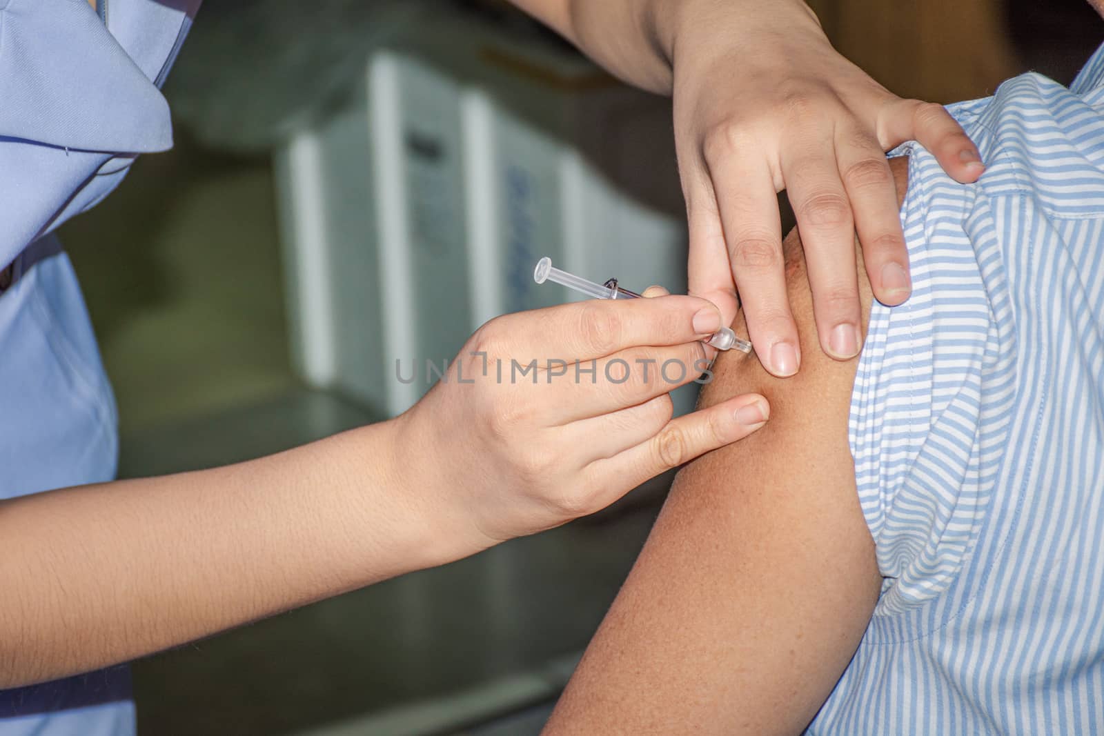 Patient asian woman health check by get vaccinated against the flu covid19 or corona virus every year by the Ministry of Health at hospital in concept illness, outbreak, healthcare in life