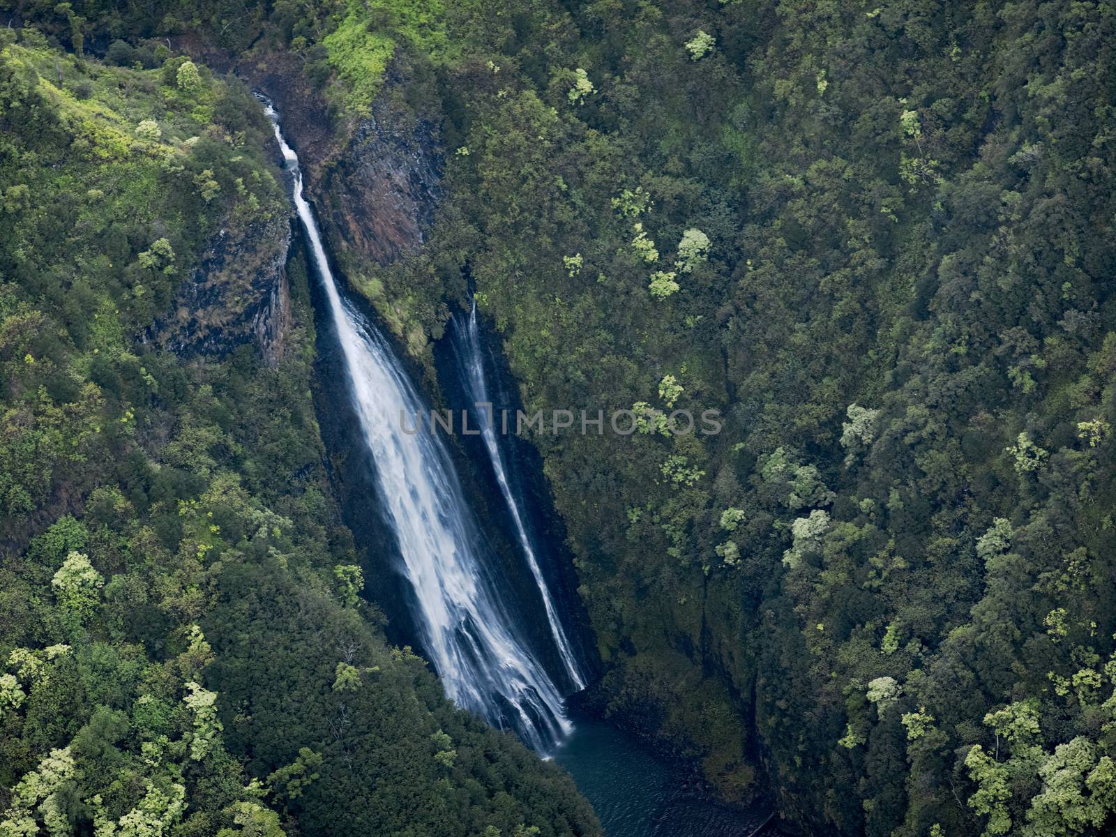 Aerial View Of A Waterfall In Kauai, Hawaii