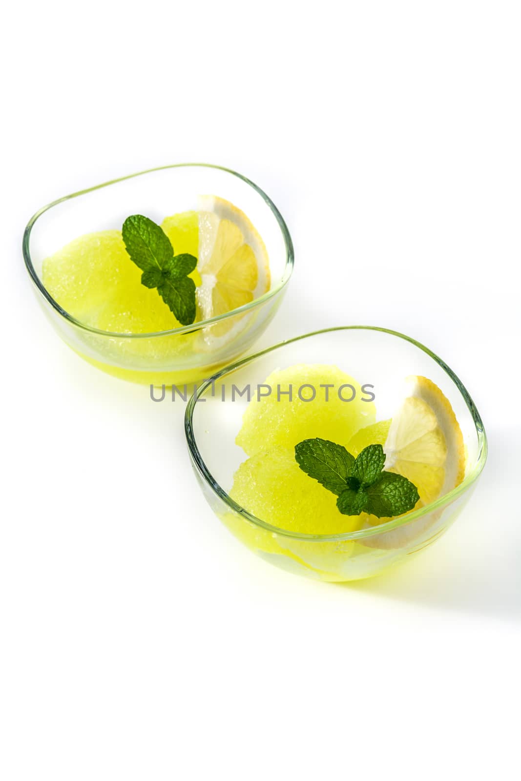 Lemon sorbet with mint in glasses  by chandlervid85
