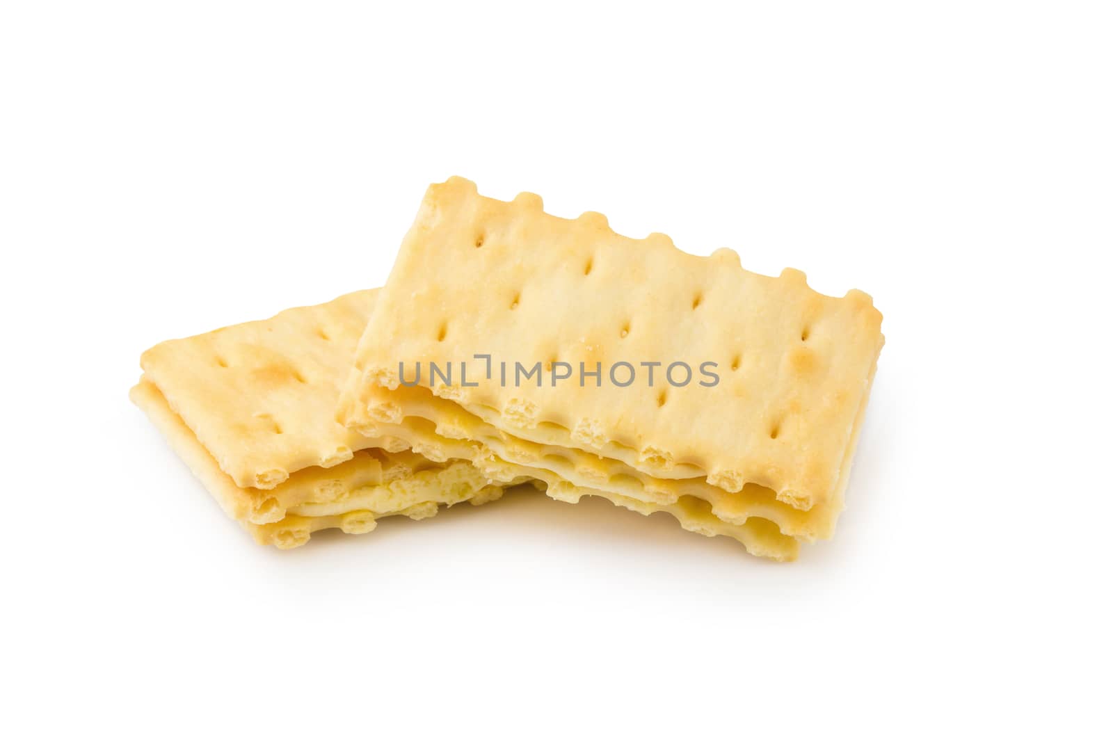 Cracker with creamy layer isolated on white background by kaiskynet