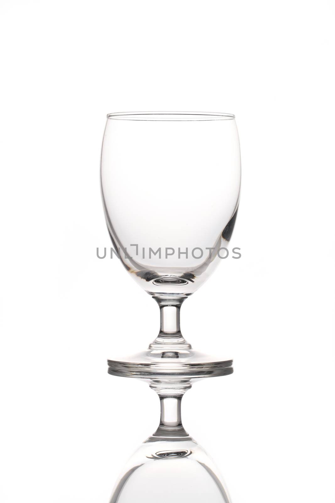 single empty wine glass isolated on the white background 