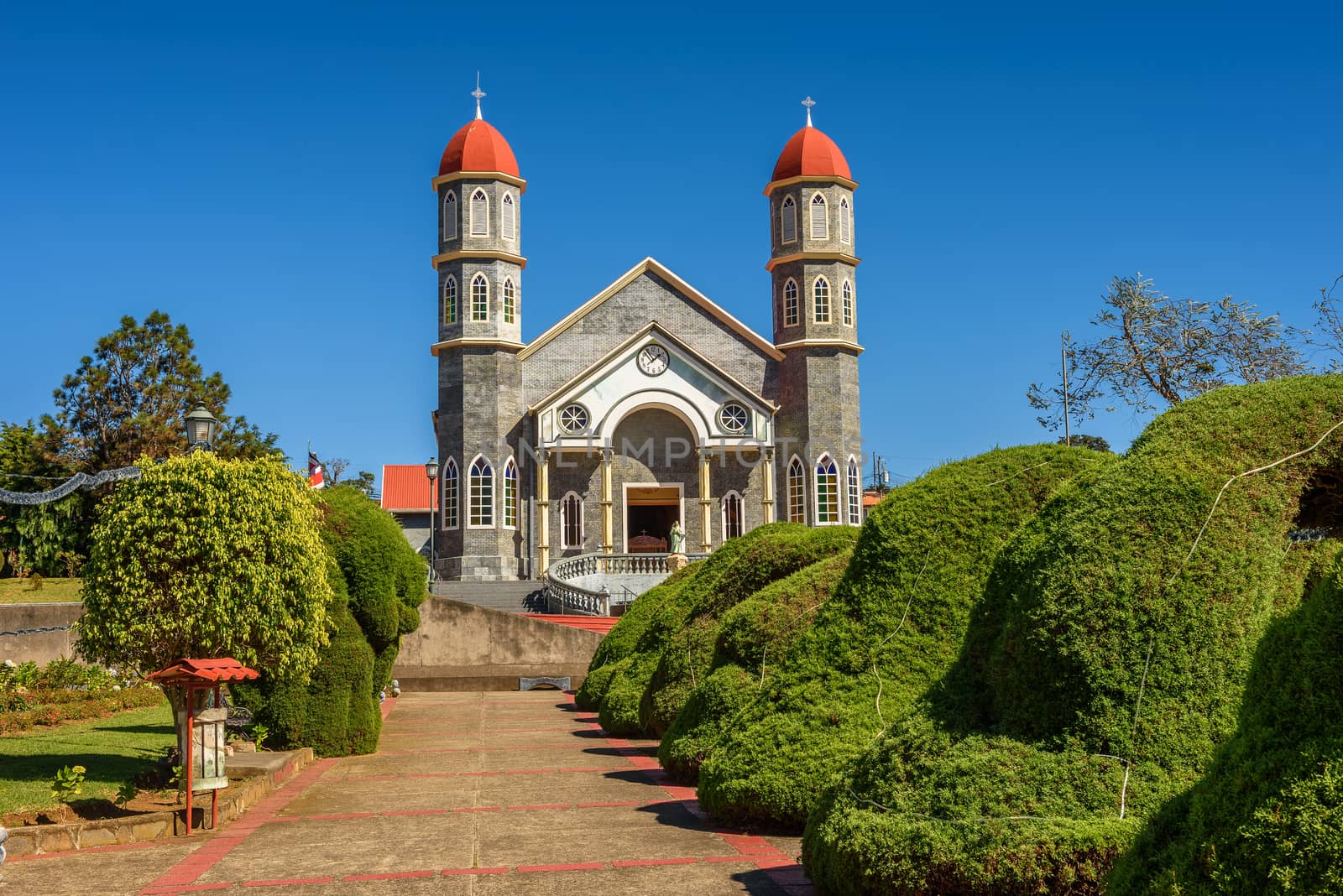 Catholic church with a park in Zarcero, Costa Rica by nickfox