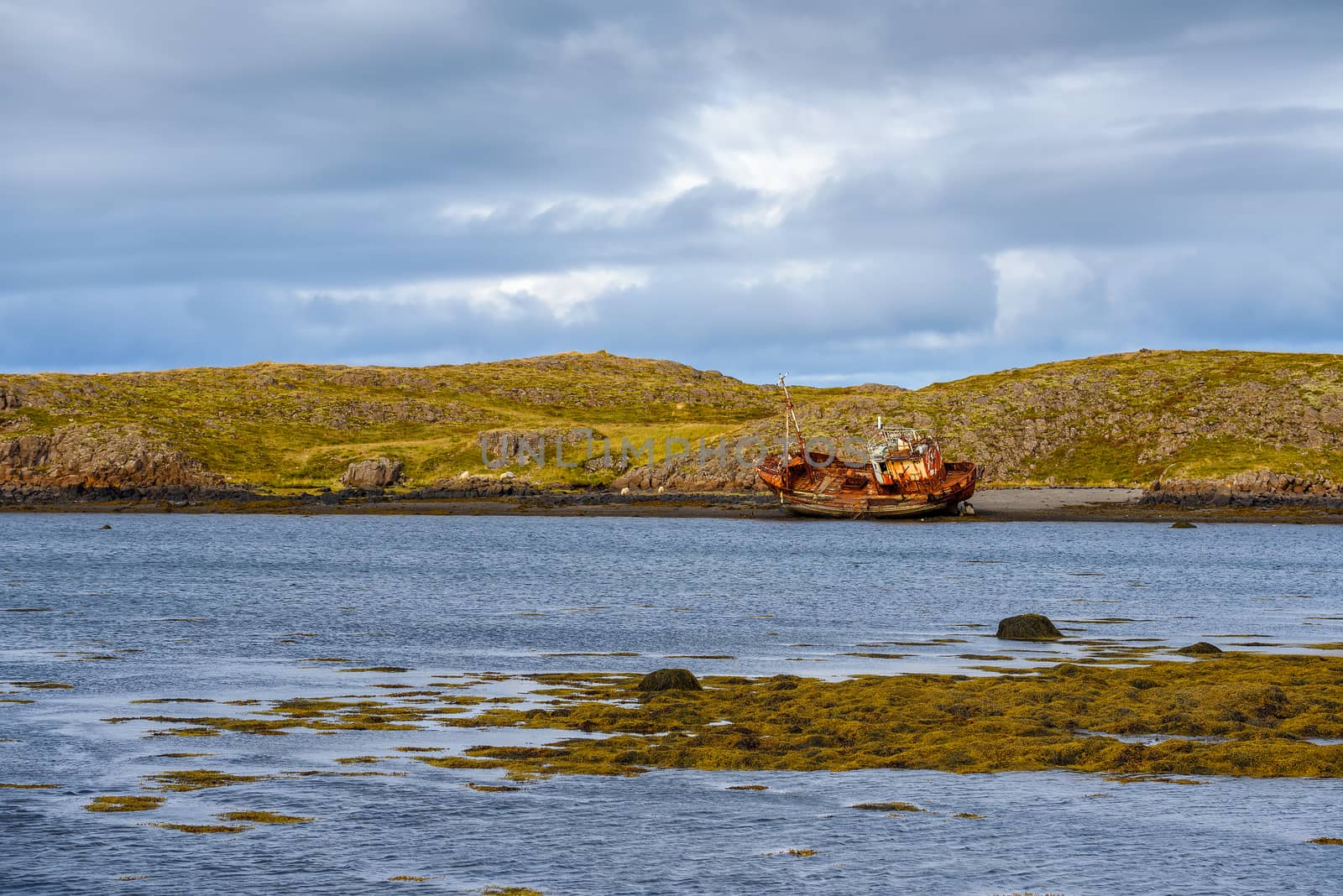 Fishing ship wreck laying on the Snaefellsnes peninsula in Iceland by nickfox