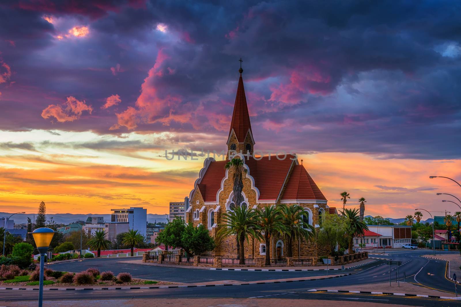 Dramatic sunset above Christchurch, Windhoek, Namibia by nickfox