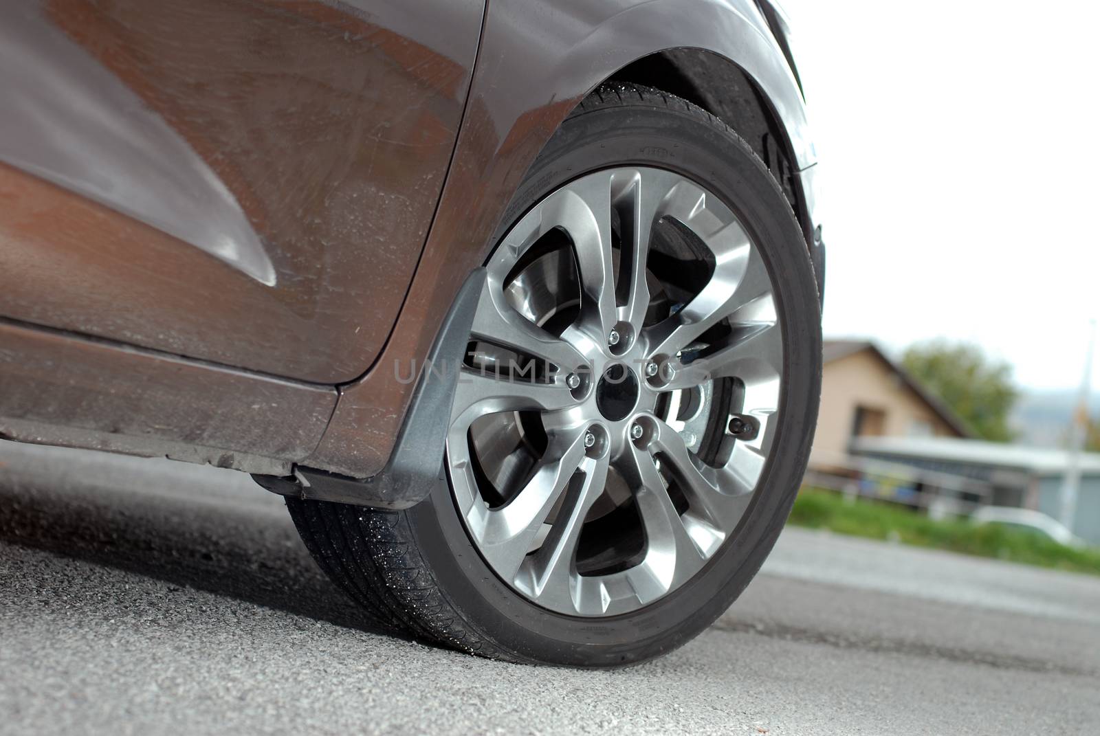 Wheel on a brown sports car