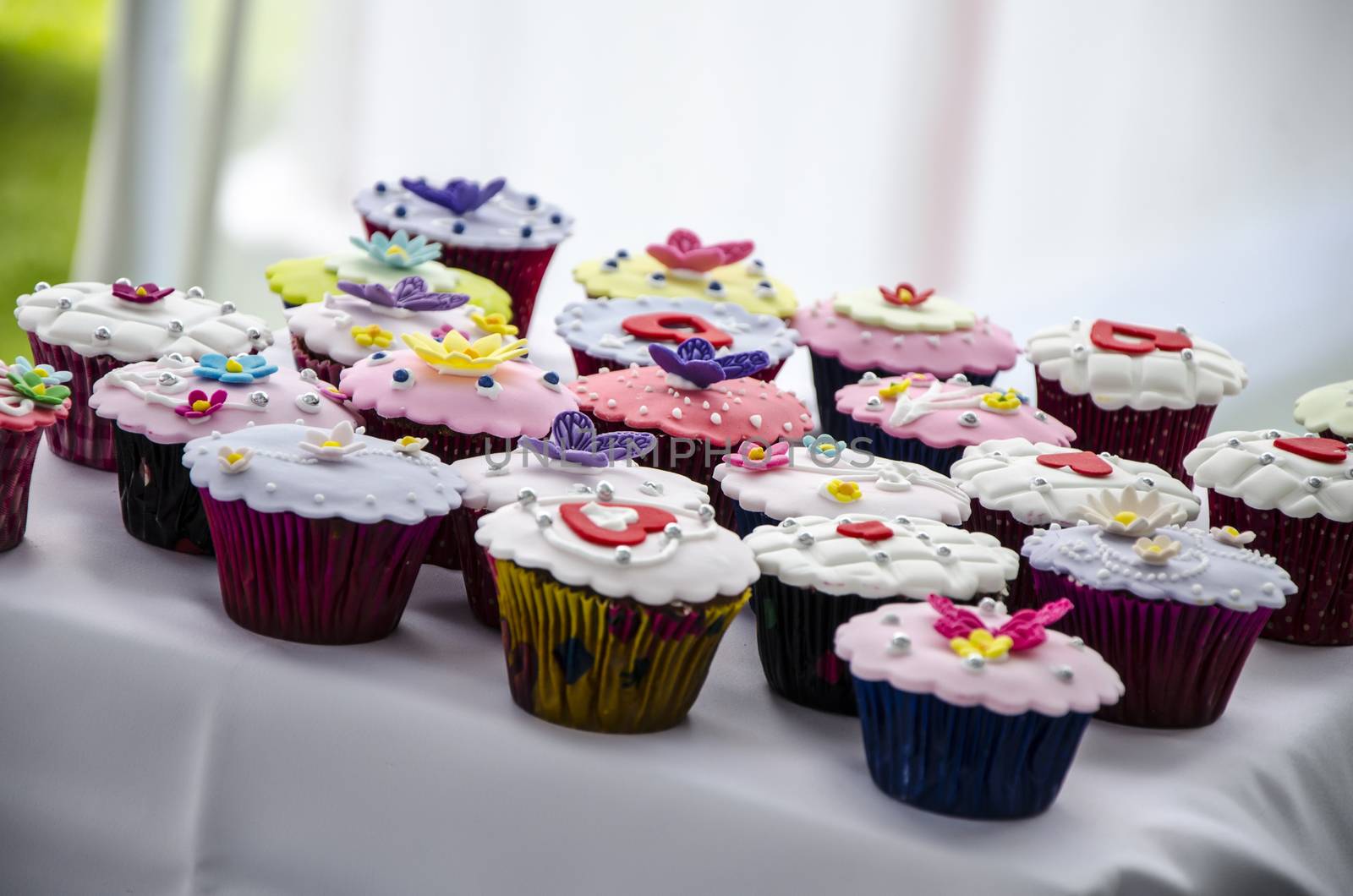 Cupcakes on the sweet table of a wedding