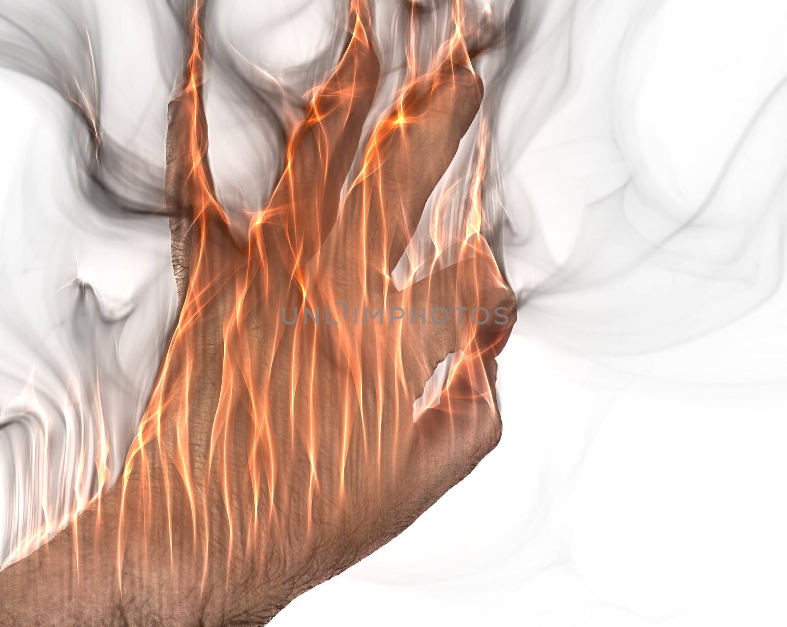 A human hand on fire burning with orange flames and some smoke in front of a white background