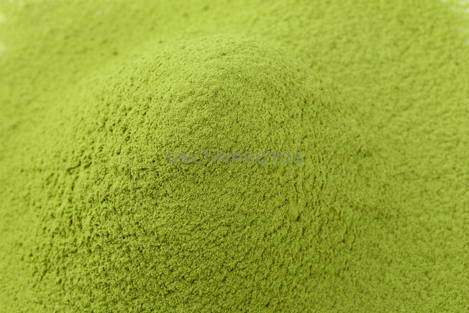 matcha powder green tea isolated on a white background.