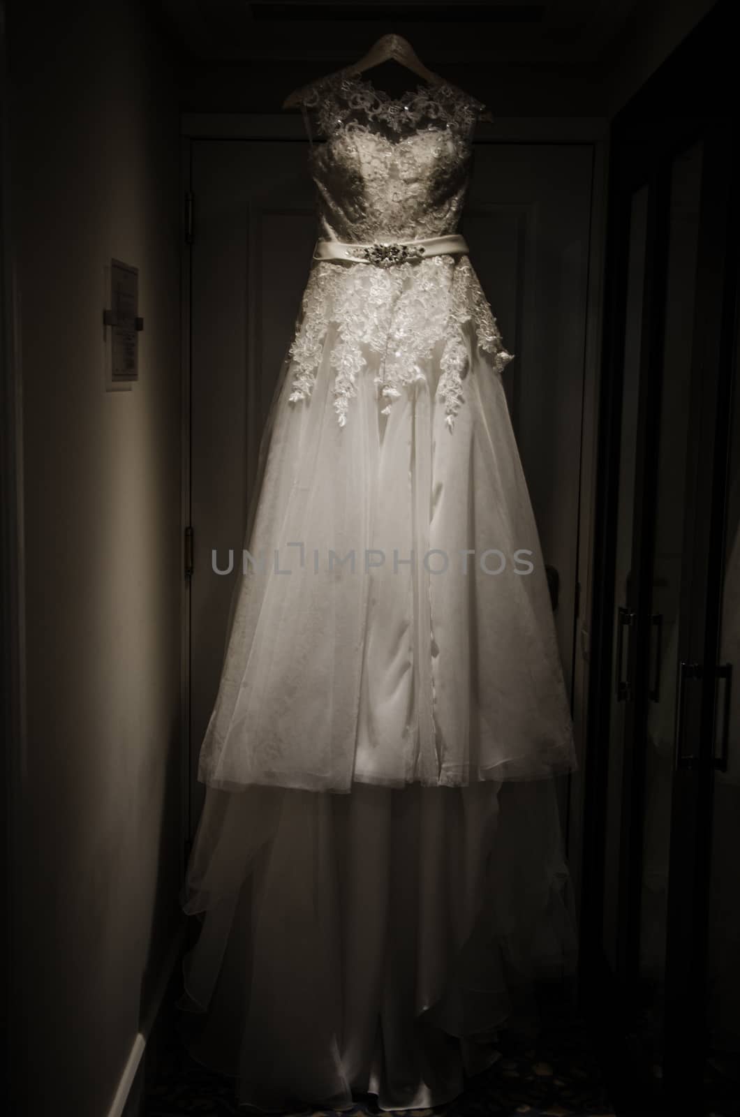 Wedding dress hanging on a coat rack