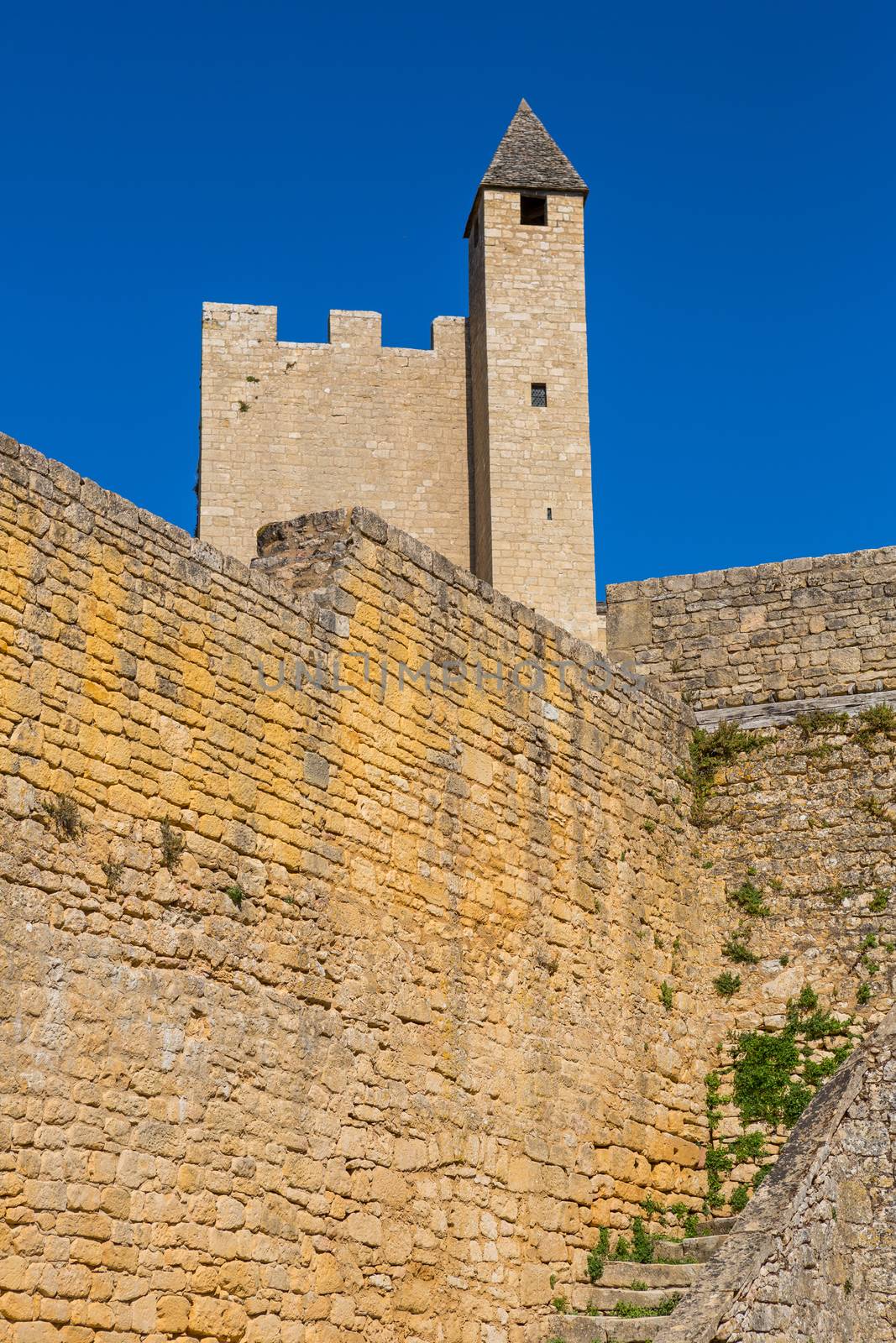 The medieval Chateau de Beynac rising on a limestone cliff above the Dordogne River. France, Dordogne department, Beynac-et-Cazenac