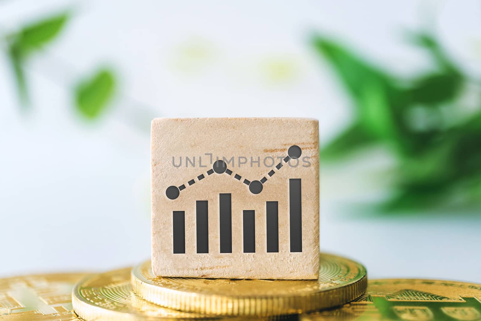 Graph rising up growht exponencial sign on wooden cube with objects such as gold coin, calculator and mini home model behide white clean background. Business financial loan property. by Suwant