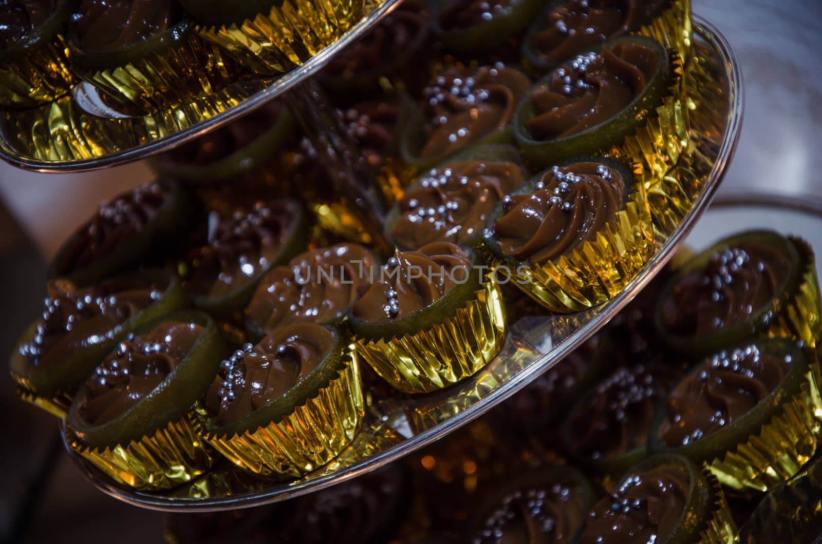 Mini chocolate cupcakes with silver candy balls