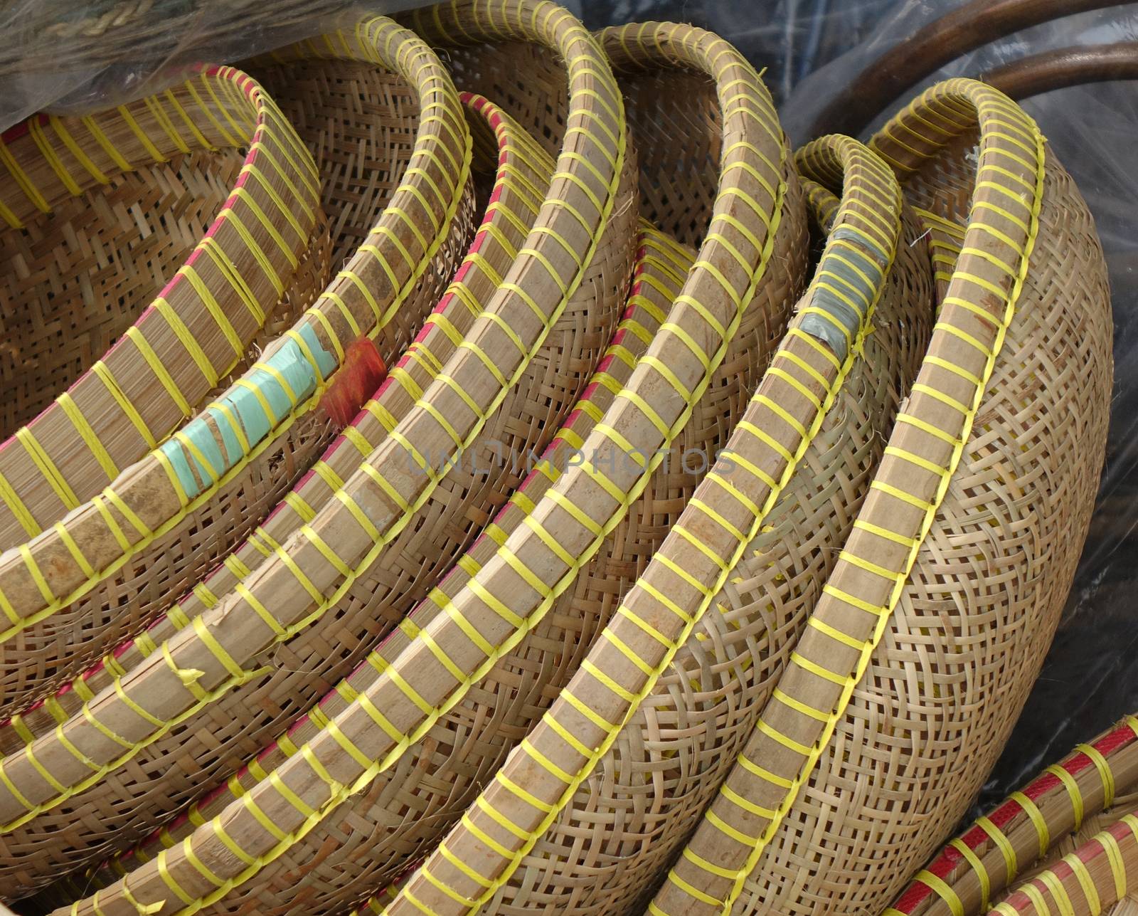 Handcrafted wicker baskets and trays at an outdoor market