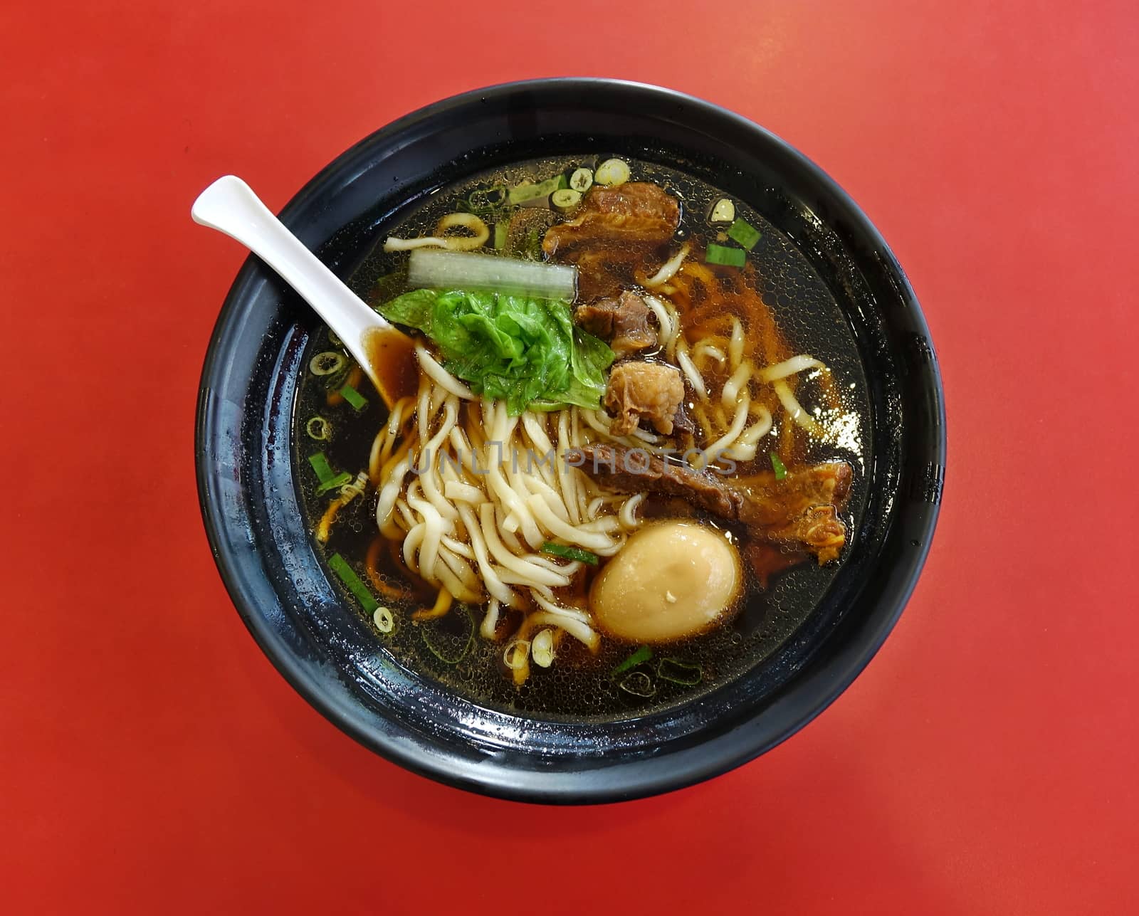 Braised beef in broth with noodles and chives is a popular dish in Taiwan