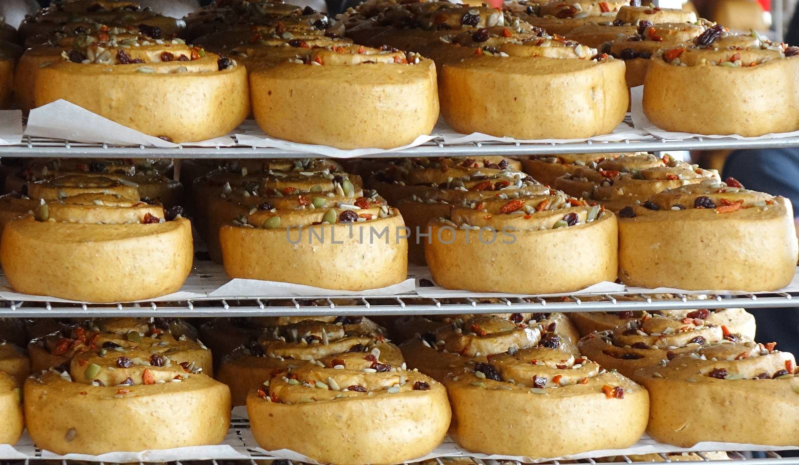 Chinese steamed buns with dried fruits and nuts on cooling racks