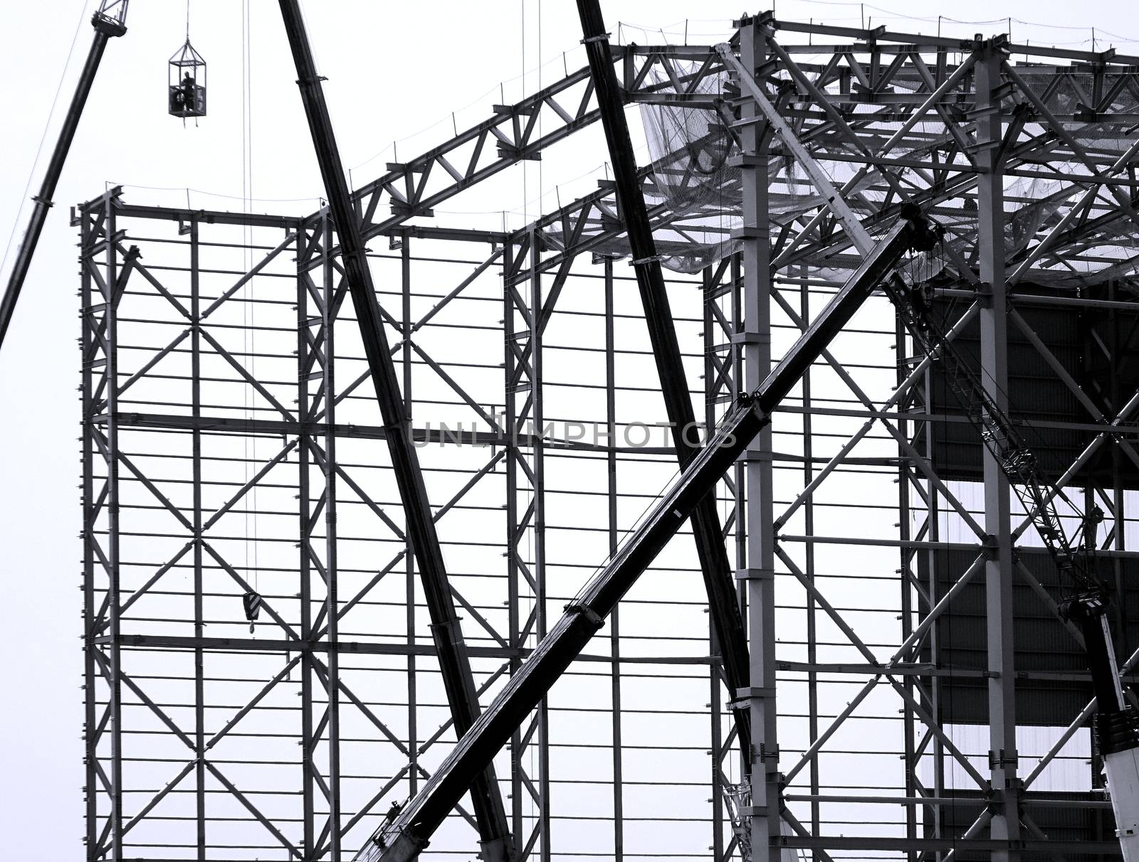 Monochrome image of a large steel structure construction